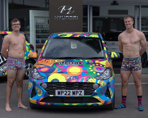Young men strip to underwear for car handover at Pebley Beach