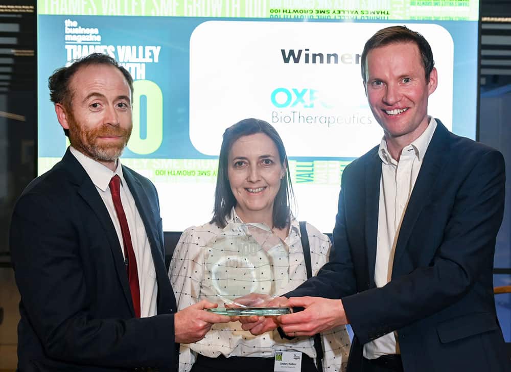 Dominic Faires, Hicks Baker (right) presents Tech Company of the Year to Lindsey Hudson and Ben Thomas from Oxford BioTherapeutics
