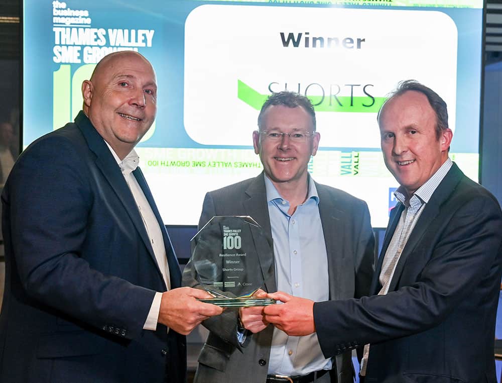 Giles Blagden, Hicks Baker (right) presents the Resilience Award to Gary Short and David Guest from Shorts Group