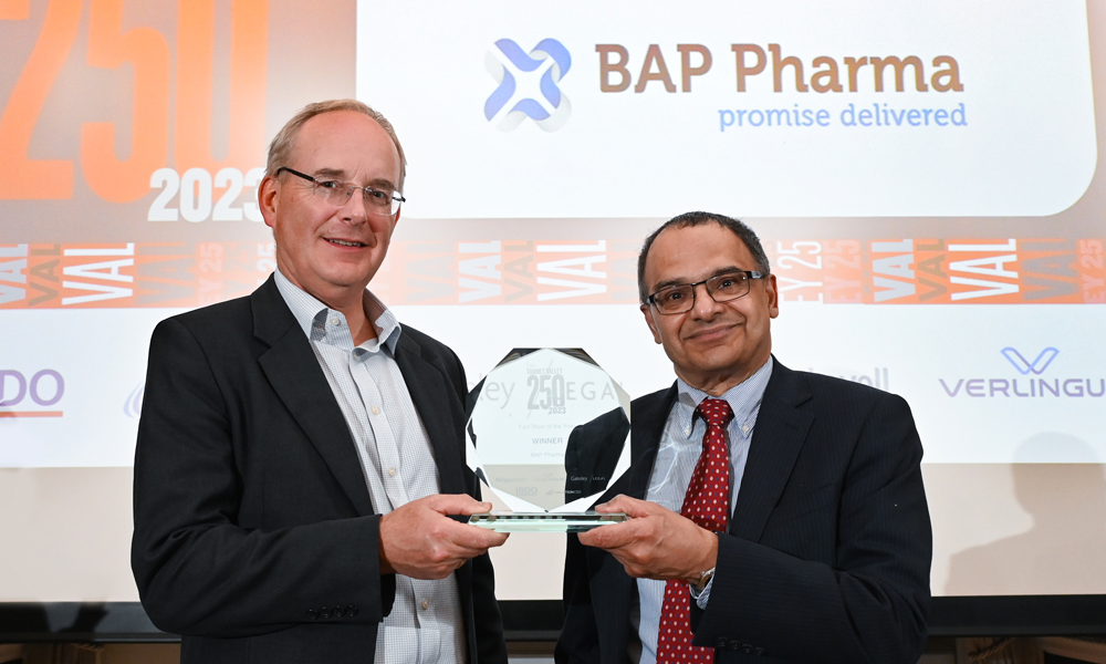 Bashir Parkar, CEO at BAP Pharma (right) receiving Fast Rising Company of the Year from Andrew Peddie, Corporate Director at sponsor Gateley Legal