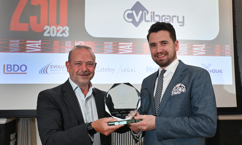 Mark Tavender, Senior Product Director at CV-Library (right) receives One to Watch trophy from Mike Whittle, Managing Director at sponsor EvolutionCBS