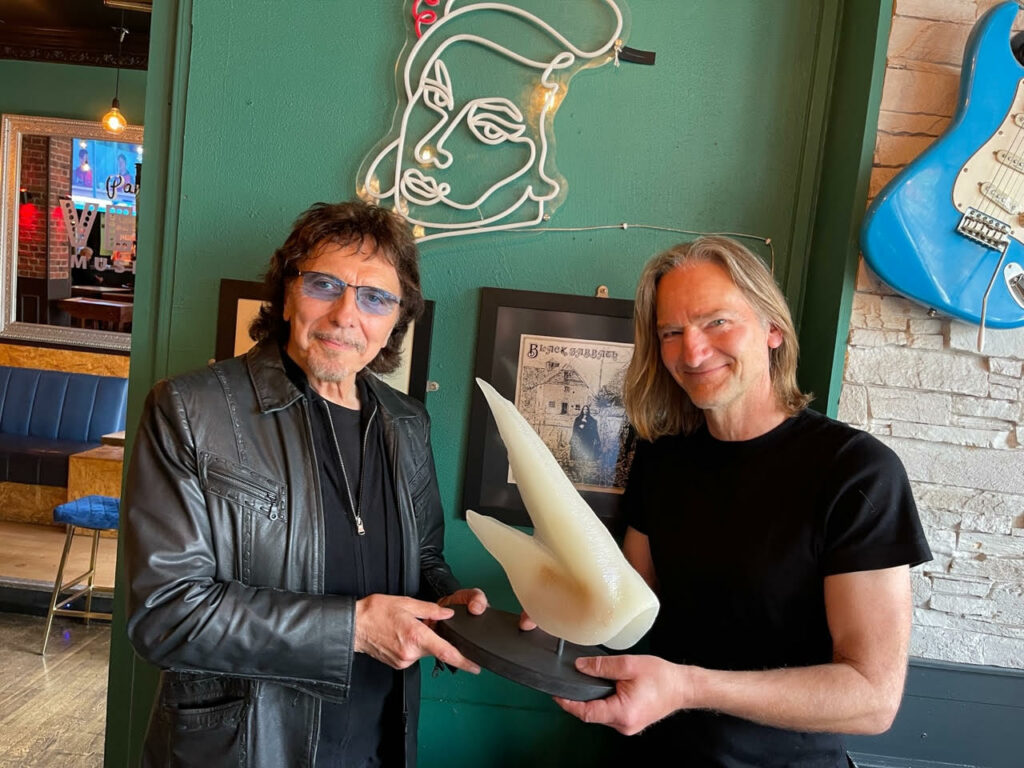 The Business Magazine article image for: Rock legend Tony Iommi presented with old fossil named after him