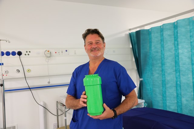 Simon Brooks Benenden Hospital’s Anaesthetics and Recovery Clinical Lead pictured with the reusable capture canister, the SID-Can - picture: benenden health