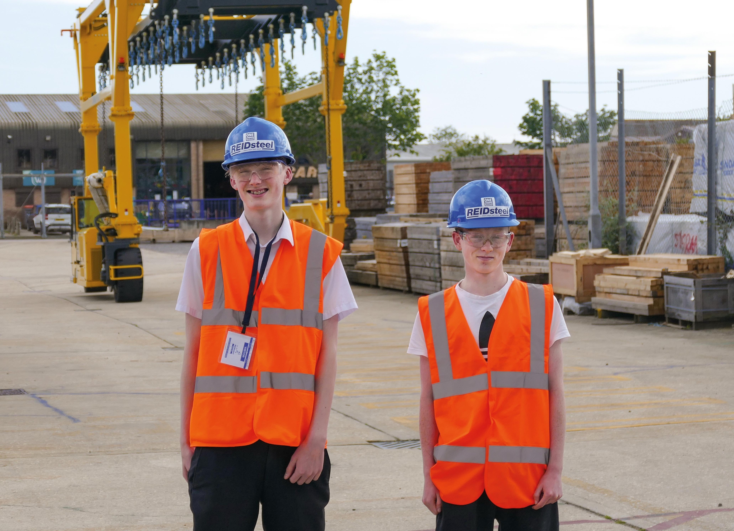 Left to right: Work experience students Milo and Tyler from Twynham school in the yard at REIDsteel - picture contributed
